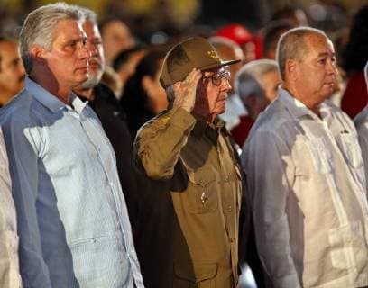 The first secretary of the Communist Party of Cuba (PCC), Raul Castro (C), attends with Cuban President, Miguel Diaz-Canel (L), and the first secretary of the PCC in Santiago, Lázaro Expósito (R), to the commemoration of the 65th anniversary of the assaults on Carlos Manuel de Céspedes and Moncada barracks in the city of Santiago de Cuba, Cuba, on 26 July 2018. Commemoration of the 65th anniversary of the assaults on the barracks Carlos Manuel de Céspedes and Moncada !ACHTUNG: NUR REDAKTIONELLE NUTZUNG!  Copyright: xErnestoxMastrascusax HAB13 20180726-636682166837511978