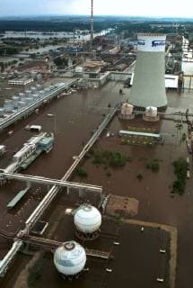 An aerial view of the flooded Czech chemical plant Spolana at Neratovice, some 20 kilometers (12 miles) north of Prague, taken Thursday, Aug.15, 2002. Chlorine gas leaked into the air from the plant after the flood waters damaged the factory. (CTKxPhoto JanxTrestik) CTKPhotoFO00432892  tre 1