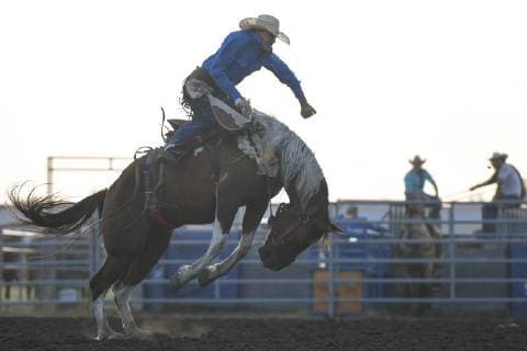 July 28, 2018 - Bonnyville, Canada - Saddle bronc rider, Cooper Thatcher, Maple Creek, SK, in action during the opening day of Bonnyville Pro Rodeo 2018..On Friday, July 27, 2018, in Bonnyville, Alberta, Canada. Bonnyville Canada - ZUMAn230 20180728_zaa_n230_059 Copyright: xArturxWidakx