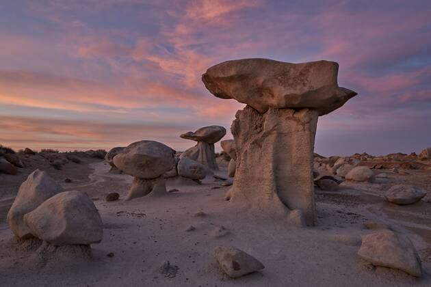 Hoodoos at dawn under red clouds, Bisti Wilderness, New Mexico, United States of America, North America Copyright: JamesxHager 764-6238