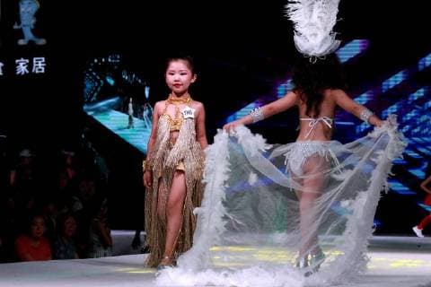 July 30, 2018 - Zhengzh, Zhengzh, China - Zhengzhou, CHINA-The kid model contest is held in Zhengzhou, central China s Henan Province. Zhengzh China  - ZUMAs145 20180730_zaa_s145_128 Copyright: xYuanxXiaoqiangx