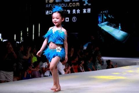 Kid model contest held in Central China The kid model contest is held in Zhengzhou, central China s Henan Province. CHINA OUT Zhengzhou Zhengzhou China  YuanxXiaoqiang