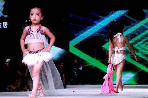 Kid model contest held in Central China The kid model contest is held in Zhengzhou, central China s Henan Province. CHINA OUT Zhengzhou Zhengzhou China  YuanxXiaoqiang
