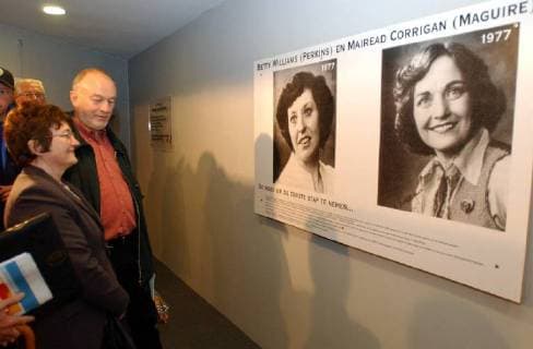BRU37 - - DIKSMUIDE, BELGIUM : Mairead Corrigan watches a pictures of herself and fellow Northern Ireland peace campaigner Betty Williams,who both won the Nobel peace prize in 1977, during a visit to the Yser tower in Diksmuide, Sunday 12 May 2002. An exhibition of women who won the Nobel peace prize currenly runs in the tower.  x939933x
