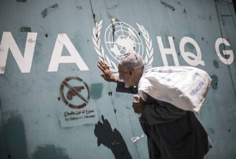 July 31, 2018 - Gaza City, The Gaza Strip, Palestine - Employees of the UN Relief and Works Agency for Palestine Refugees in the Near East(UNRWA)and their families protest against job cuts announced by the agency outside its offices in Gaza City on July 31, 2018. Gaza City Palestine - ZUMAq100 20180731_zaa_q100_010 Copyright: xMahmoudxIssax