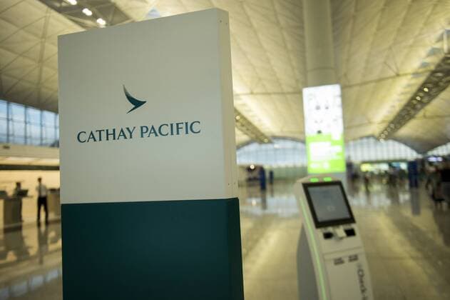 Hong Kong: Cathy Pacific job cuts A photo showing a sign for the Hong Kong base Cathay Pacific airways in Hong Kong international Airport in Hong Kong, China. 31 JULY 2018. Cathay Pacific has issues and internal memo telling staff to prepare for restructuring in the company , Cathay has plans to cut Overseas job in hoping that it will help Cathay turn a Profit , the Company has 7,600 staff in 100 locations outside Hong Kong, The Hong Kong base airline has already gone through a major staff cut last may at its head office which slashed 600 jobs , this was the first step in a three year exercise and to spent HK$ 224 million on restructuring , this is an effort to turn a profit which the company has been seeing a great loss on their yearly financial report. Hong Kong  VernonxYuen