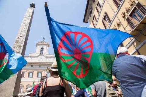 Italy: ROM and Sinti against intolerance in Rome Demonstration in front of Palazzo di Montecitorio in Rome organized by Rom and Sinti communities to commemorate the extermination of Rom and Sinti on 2 August 1944 in the Auschwitz-Birkenau concentration camp Roma RM Italy Piazza Montecitorio  MatteoxNardone