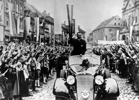 Sudeten German citizens wave to Sudeten German Party leader Konrad Henlein as he drive through Chomutov, Czechoslovakia on July 7, 1938. (CTKxPhoto) CTKPhotoFO00043237 