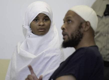 August 13, 2018 - Taos, NM, U.S. - Albuquerque Journal.hearing for the five adults charged with child abuse in the Amalia compound case were in court Monday afternoon to see judge Sarah C. Backus. Pictured is Hujrah Wahhaj(Cq) talking to Siraj Wahhaj(Cq) during the hearing. .Taos, New Mexico Albuquerque Journal Taos U.S. - ZUMAab1_ 20180813_zaf_ab1_018 Copyright: xRobertoxE.xRosalesx