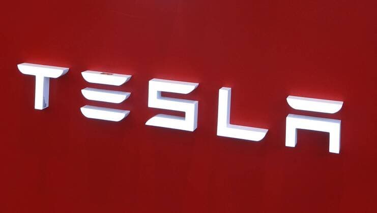 August 17, 2018 - New York City, New York, U.S. - Tesla logo seen on a door in car showroom located in the Meatpacking District in Manhattan. Tesla stock recently dropped 9 percent after Elon Musk described stress during his excruciating year which resulted in a 8 billion dollar shareholder loss. New York City U.S. - ZUMAk03_ 20180817_zaf_k03_104 Copyright: xNancyxKaszermanx