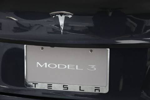 August 17, 2018 - New York City, New York, U.S. - Tesla logo with Model 3 license plate seen in the showroom located in the Meatpacking District in Manhattan. Tesla stock recently dropped 9 percent after Elon Musk described stress during his excruciating year which resulted in a 8 billion dollar shareholder loss. New York City U.S. - ZUMAk03_ 20180817_zaf_k03_151 Copyright: xNancyxKaszermanx