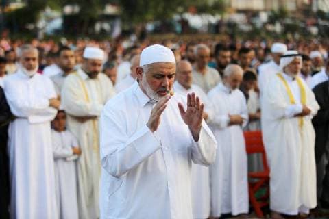August 21, 2018 - Gaza City, Gaza Strip, Palestinian Territory - Chairman of the political bureau of the Hamas Palestinian Islamist movement, Ismail Haniyeh performs the prayer of Eid al-Adha or the feast of sacrifice in Gaza city, on August 21, 2018. Muslims around the world are celebrating Eid al-Adha, the Feast of Sacrifice , which marks the end of the annual pilgrimage or hajj to the Saudi holy city of Mecca and in remembrance of Abraham s readiness to sacrifice his son to God Gaza City Palestinian Territory - ZUMAap3_ 20180821_zaf_ap3_045 Copyright: xAshrafxAmrax