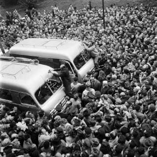 Czechoslovak world travellers Jiri Hanzelka and Miroslav Zikmund are surrounded by cheering crowd before their departure to Asia and Oceania. Prague, Czechoslovakia, on April 22, 1959. (CTKxPhoto ZdenekxHavelka) CTKPhotoFO02093328 