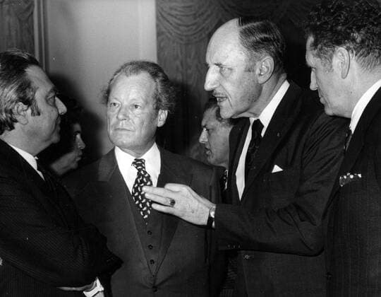 - The picture is about the state visit to Belgium of the Federal Republic of Germany chancellor, M. Brandt. The picture shows Willy Brandt with M. Luns (NATO general secretary), and president of European Commission, M. Ortoli at castle Stuyvenbergh (Brussels). ARCHIVES  x34477041x