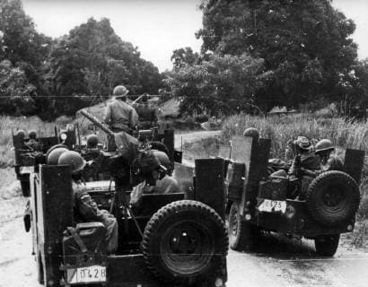- KATANGA, CONGO (FILE) : This file picture dated 14 October 1985 is about the unrest period following Katanga Independence proclamation. On the picture : a motorized Katangese gendarmerie patrol crossing a Baluba village seemingly abandonned. ARCHIVES  x34582612x