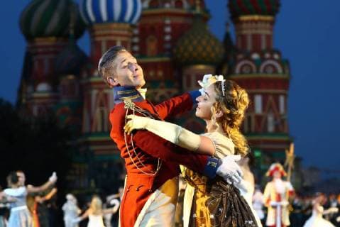 MOSCOW, RUSSIA â€“ AUGUST 24, 2018: A couple in period costume dancing at the opening of the 2018 Spasskaya Tower International Military Music Festival, in Moscow s Red Square. Anton Novoderezhkin TASS  TS08DED7