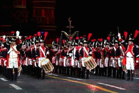 MOSCOW, RUSSIA â€“ AUGUST 24, 2018: Members of the Vieux Grenadiers of Geneva company perform at the opening of the 2018 Spasskaya Tower International Military Music Festival, in Moscow s Red Square. Anton Novoderezhkin TASS  TS08DEFF