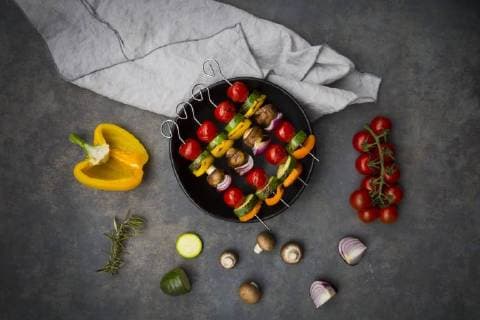 Vegetarian grill skewers on bowl and ingredients  LVF07188