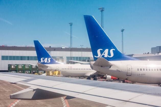 25.05.2018, Kopenhagen, Dänemark, DNK - Flugzeuge der SAS stehen am Terminal am Flughafen Kopenhagen.