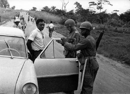 - STANLEYVILLE, CONGO (FILE) : This file picture dated 05 November 1959 is about events before Congo Independence. End of october and beginning of November there was a MNC (Mouvement National Congolais) congress at Stanleyville. There were riots following the congress. The Force publique had to intervene. On the picture : soldiers checking papers outside the municipality of Mangobo. ARCHIVES  x37606146x