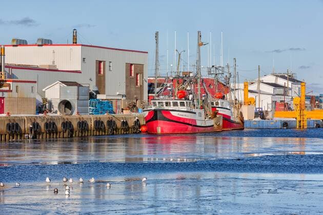 Fishing boats tied up at wharf in winter, Glace Bay, Nova Scotia, Canada  acp115376 Barrettx&xMackay