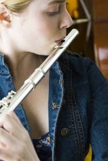 Flautist practicing  Copyright: MichèlexConstantini B61997506