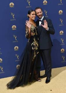 Actors Maria Dolores Dieguez (L) and Joseph Fiennes attend the 70th annual Primetime Emmy Award at the Microsoft Theater in downtown Los Angeles on September 17, 2018.  LAP20180917033 CHRISTINExCHEW
