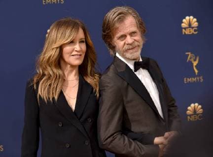 Actors Felicity Huffman (L) and William H. Macy attend the 70th annual Primetime Emmy Award at the Microsoft Theater in downtown Los Angeles on September 17, 2018.  LAP20180917042 CHRISTINExCHEW