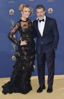 Actor Antonio Banderas (R) and Nicole Kimpel attend the 70th annual Primetime Emmy Awards at the Microsoft Theater in downtown Los Angeles on September 17, 2018.  LAP201809171506 CHRISTINExCHEW