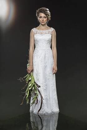 Portrait of sad young bride holding wilted bouquet while standing in water against gray background  Copyright: VladimirxGodnik fStopImages1402017