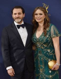 Actor Michael Stuhlbarg (L) and Mai-Linh Lofgren attend the 70th annual Primetime Emmy Award at the Microsoft Theater in downtown Los Angeles on September 17, 2018.  LAP201809171215 CHRISTINExCHEW