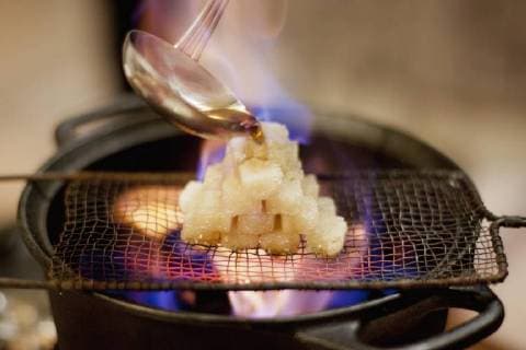 Close-up of rum is being poured on sugar cubes while preparing Feuerzangenbowle  Copyright: IsabellaxStahl fStopImages1626011