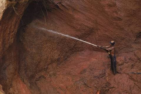 Gold mining with a high pressure hose near El Callao, Venezuela, South America., Venezuela Copyright: RobertxCaputo 2930303502