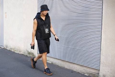 A chic showgoer posing on the street outside the Prada show during Milan Fashion Week - Sept 20, 2018 - MFW: Spring 2019 Street Style Day 2, New York New York United States  Copyright: xValentinaxRanierix h_00547975