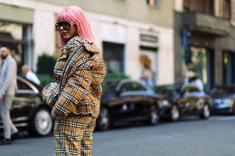 A chic showgoer posing outside the Dolce & Gabbana runway show during Milan Fashion Week - Sept 23, 2018 - MFW: Spring 2019 Street Style Day 5, Milan Italy  Copyright: xZachxDoddsx h_00549336