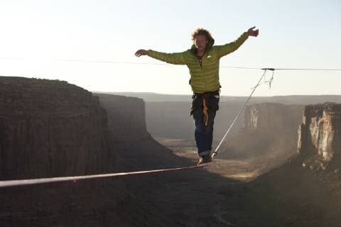 Andy Lewis highlining in Moab Utah, Moab Utah United States Copyright: JaredxAlden 4517100006