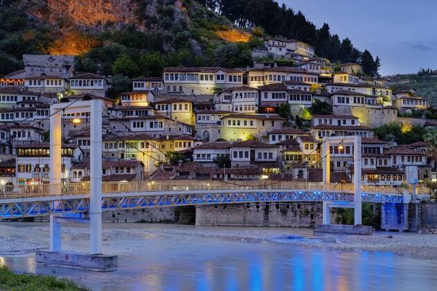 Albania, Berat County, Berat, Mangalem, Ottoman houses and castle rock at blue hour, bridge over Osum river  SIEF07865