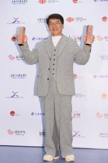 Hong Kong kungfu superstar Jackie Chan poses with his trophies during the 2018 Love Radio Music Awards ceremony in Shanghai, China, 26 September 2018. Jackie Chan wins big at Love Radio Music Awards in Shanghai  20180926_59004