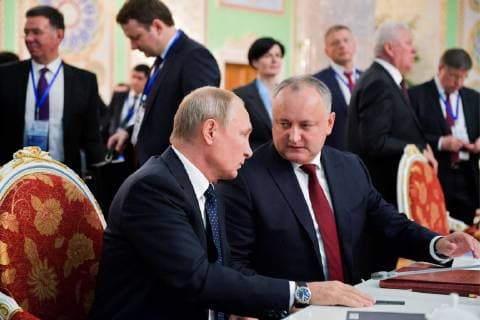 DUSHANBE, TAJIKISTAN â€“ SEPTEMBER 28, 2018: Russia s President Vladimir Putin (L) and Moldova s President Igor Dodon at a CIS Heads of State Council meeting at the Somon Palace. Alexei Druzhinin Russian Presidential Press and Information Office TASS  TS091DA4