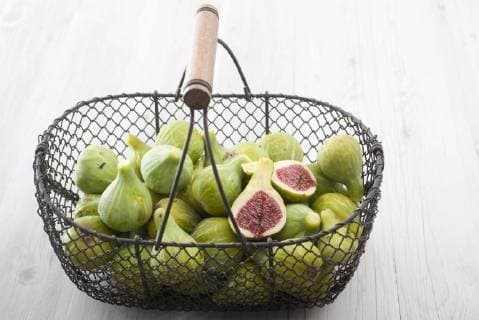 Fresh figs in basket  Copyright: LaurencexMouton B79401414