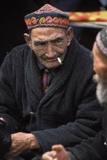 The hard life of the nomadic herder can be seen on this Kazakh man s face at a local gathering in Altai Tavan Bogd National Park. Kazakhs occupy far western Mongolia, including Altai Tavan Bogd National Park. Altai Tavan Bogd National Park is in the far western corner of Mongolia and contains the country s highest peaks., Bayan Ulgii Mongolia Copyright: TedxWood 9554700018