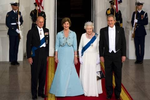 Queen Elizabeth II (2nd R) of England, her husband Prince Philip (L), US President George W. Bush (R) and First Lady Laura Bush pose for photographers on the North Portico of the White House after the Queen and Prince arrived for a State Dinner in Washington, DC, Monday, May 7, 2007. The dinner is the first white tie event hosted by the president and first lady., Washington D.C. USA Copyright: JayxL.xClendenin 9620800008