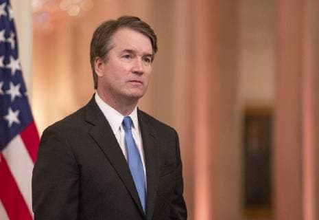 October 8, 2018 - Washington, District of Columbia, U.S. - Associate Justice of the Supreme Court Brett Kavanaugh listens as United States President Donald J. Trump makes remarks as he hosts a ceremonial swearing-in ceremony for Kavanaugh in the East Room of the White House in Washington, DC on Monday, October 8, 2018. Kavanaugh formally took the oath on Saturday, hours after he was confirmed by the US Senate. Washington U.S.  - ZUMAc306 20181008_zaa_c306_006 Copyright: xRonxSachsx