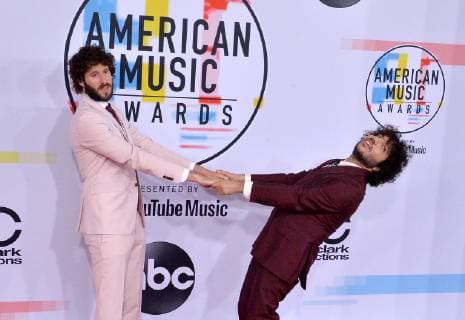 Singers Benny Blanco and Lil Dicky arrive for the 46th annual American Music Awards at the Microsoft Theater in Los Angeles on October 9, 2018.  LAP20181009201 JIMxRUYMEN