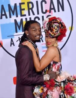 Singers Offset (L) and Cardi B arrive for the 46th annual American Music Awards at the Microsoft Theater in Los Angeles on October 9, 2018.  LAP20181009257 JIMxRUYMEN