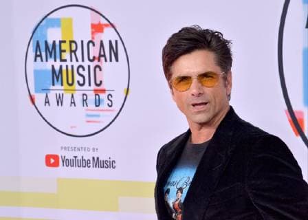 Actor John Stamos arrives for the 46th annual American Music Awards at the Microsoft Theater in Los Angeles on October 9, 2018.  LAP20181009446 JIMxRUYMEN