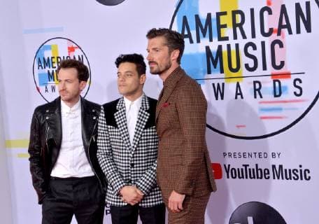 (L-R) Joseph Mazzello, Rami Malek, and Gwilym Lee arrive for the 46th annual American Music Awards at the Microsoft Theater in Los Angeles on October 9, 2018.  LAP20181009569 JIMxRUYMEN
