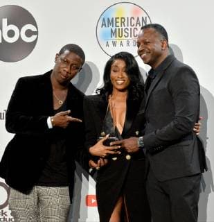 Cleopatra Bernard (C) who accepted the award for Favorite Album - Soul R&B on behalf of XXXTentacion, appears backstage during the 46th annual American Music Awards at the Microsoft Theater in Los Angeles on October 9, 2018.  LAP20181009583 JIMxRUYMEN