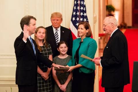 October 8, 2018 - Washington, DC, United States of America - U.S President Donald Trump looks on as retired Supreme Court Justice Anthony Kennedy, right, performs a symbolic public swearing-in of Judge Brett Kavanaugh to be the Supreme Court 114th justice at the White House October 8, 2018 Washington, DC. Ashley Kavanaugh, wife, holds the Bible, and their daughters Liza and Margaret look on. Washington United States of America - ZUMAp138 20181008_zaa_p138_009 Copyright: xJoycexN.xBoghosianx