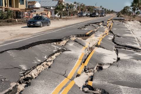 State Road 98 is cracked and sinking following the storm surge from Hurricane Michael in Mexico Beach, Florida on October 13, 2018.  WAP20181013538 KENxCEDENO